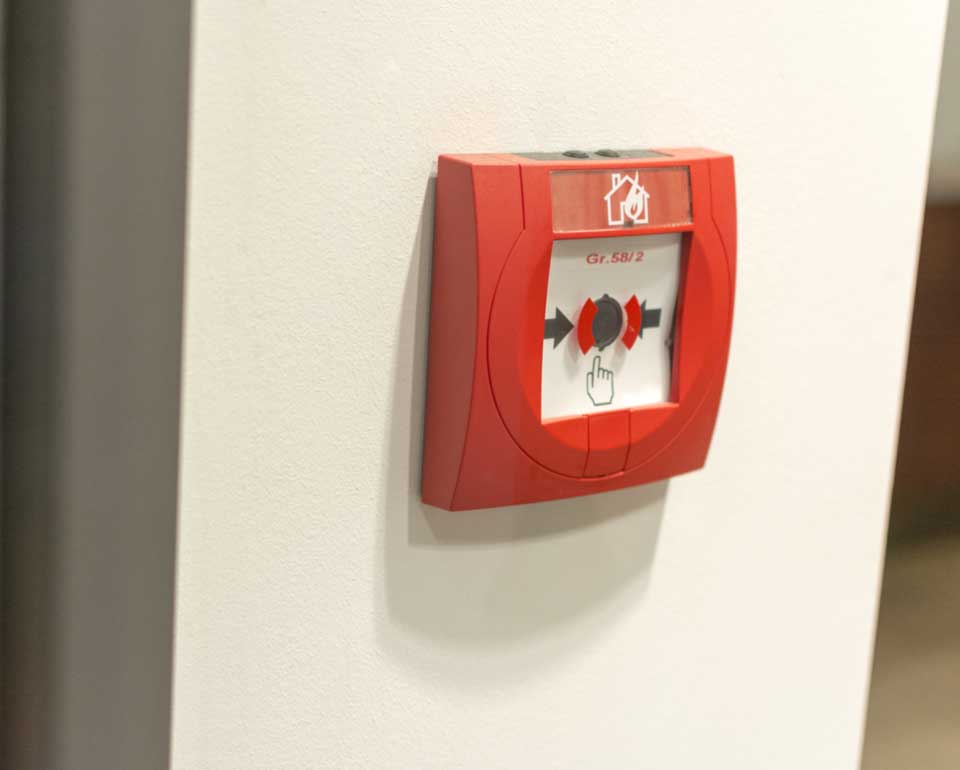 close up of a fire alarm system (EN 54 series), placed in the wall of a building for safety against fire