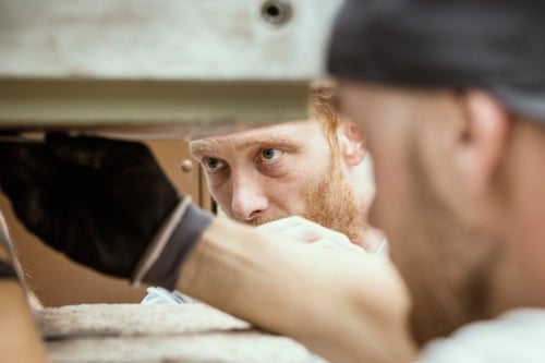 Two employees doing a rotation machinery condition assessment