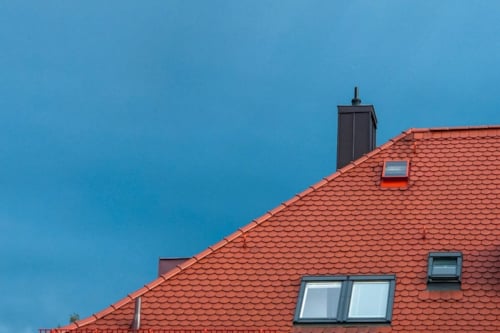 partial image if a roof with roof light, windows and an ancillary product